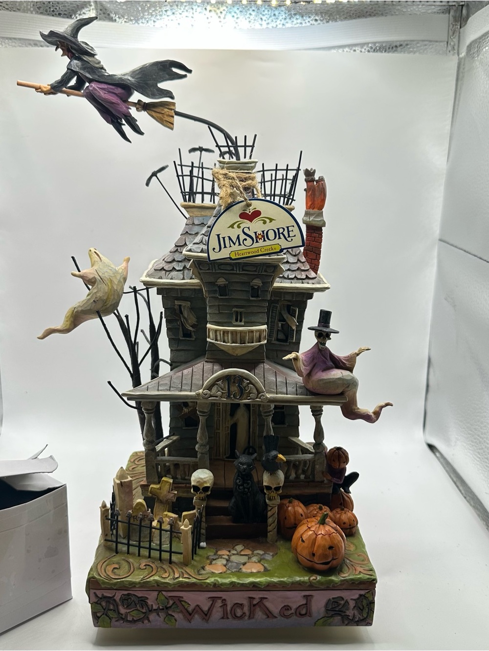 Jim Shore Haunted House Sculpture in Purple and Orange Accents